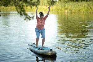 SUP Fitness mit Yoga Elementen - Training auf dem SUP Board bei Stand Up Paddler Oldenburg